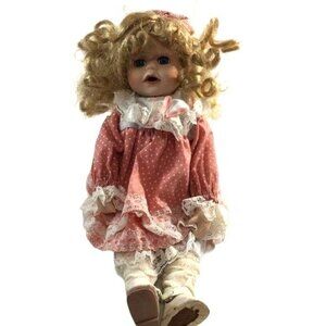 Collectible Vintage Porcelain Doll with Blonde Curls and Life-like Lashes